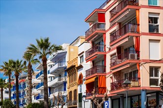 Row of houses on the beach promenade in Sitges, Spain, Europe
