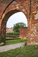 Medieval gate ruins, entrance to the castle and monastery park in Dargun, Mecklenburg Lake