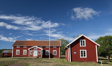 Falun red or Swedish red painted houses, farm, Geta, Aland, or Aland Islands, Gulf of Bothnia,