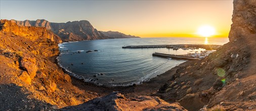 Panoramic of the cliffs and coast of Agaete at summer sunset in Gran Canaria. Spain