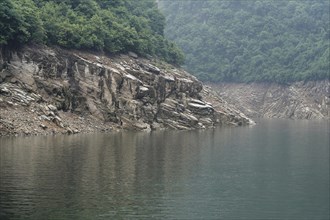 Cruise ship on the Yangtze River, Hubei Province, China, Asia, Calm river flows along a rocky coast