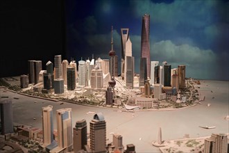 A detailed model of a city with miniature buildings and distinctive structures, Shanghai, China,