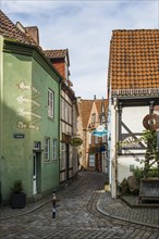 Alley with historic houses, Schnoorviertel, Schnoor, Old Town, Hanseatic City of Bremen, Germany,