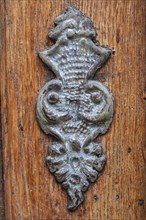 Application on wood, antiqued door fitting on a historic front door, Old Town Lindau (Lake