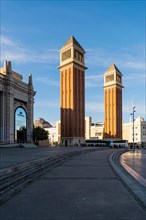 The Venetian Towers, Torres Venecianes or Venetian Towers in the morning light at Placa Espana in