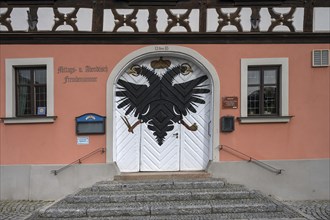 Entrance portal to the historic Obleyhof inn, built around 1750, Marktpl. 1, Baunach, Upper
