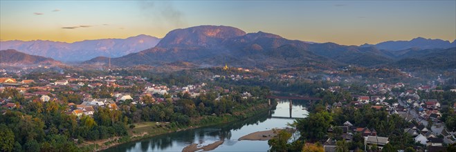 Panorama over Luang Prabang with Nam Khan River and Wat Phol Pao in the background, Laos, Asia