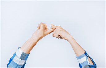 Friendship concept in sign language. Hands gesturing FRIENDSHIP symbol in sign language