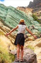 Enjoying the freedom in the natural monument at the Azulejos de Veneguera or Rainbow Rocks in