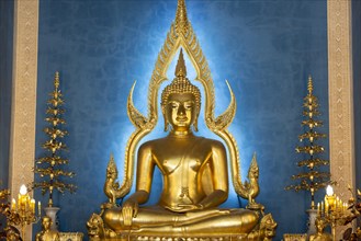 Golden Buddha statue, Bhumispara-mudra, Buddha Gautama at the moment of enlightenment, in the