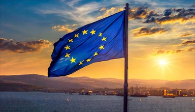 The flag of the EU flutters in the wind, isolated, towards sunset