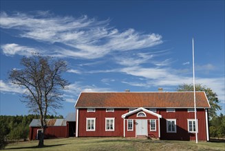 Falun red or Swedish red painted houses, farm, Geta, Aland, or Aland Islands, Gulf of Bothnia,