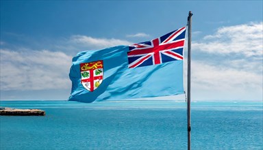 The flag of Fiji, Fiji, flutters in the wind, isolated, against the blue sky, Oceania