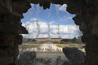 View of Schoenbrunn Palace and park from the Neptune Fountain, Schoenbrunn, Vienna, Austria, Europe