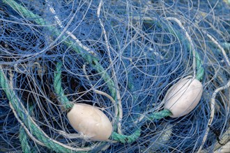 Blue plastic fishing nets, ropes and floats, Brittany, France, Europe