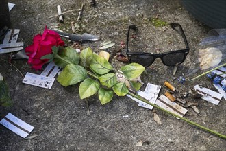 Rose, cigarettes, sunglasses, grave of Serge Gainsbourg, Montparnasse cemetery, Paris, France,
