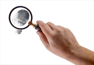 Male hand holding magnifying glass viewing A fingerprint on a white background