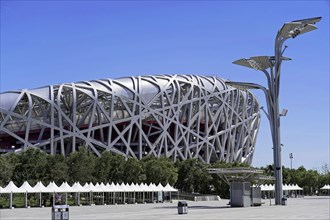 Beijing, China, Asia, Close-up of the outer metal mesh of a stadium under a bright blue sky, Asia