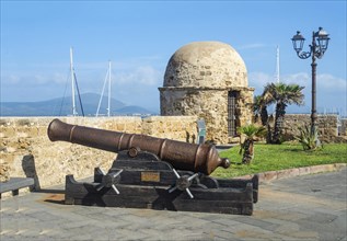 Medieval cannon with watchtower at fortress wall of Alghero, Sardinia, Italy, Mediterranean,