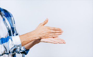 Hands gesturing STOP in sign language. Close up of hands gesturing STOP in sign language