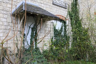 Art Nouveau house overgrown with ivy, Saint-Dizier, Haute-Marne department, Grand Est region,