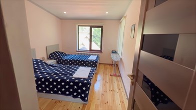 Interior of a new house, bedroom with a large bed
