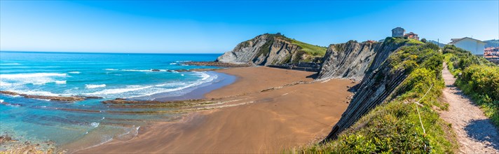Panoramic of the Itzurun beach without people in the Flysch Basque Coast geopark in Zumaia,