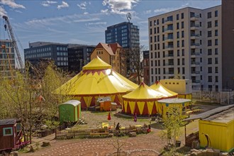 Circus tent and modern buildings at Ostbahnhof Berlin 2015, Germany, Europe