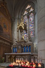 Marian altar with sacrificial candles, Notre Dame de l'Assomption Cathedral, Lucon, Vendee, France,