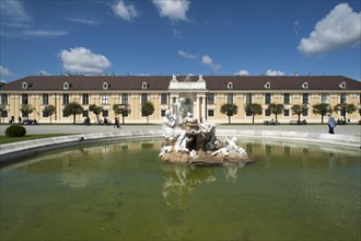Fountain, rear right side building of Schoenbrunn Palace, Vienna, Austria, Europe