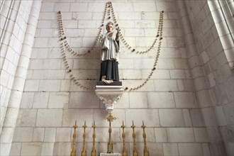 Sculpture of a saint, Notre Dame de l'Assomption Cathedral, Lucon, Vendee, France, Europe