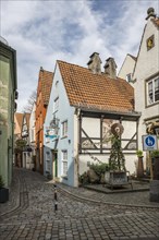 Alley with historic houses, Schnoorviertel, Schnoor, Old Town, Hanseatic City of Bremen, Germany,
