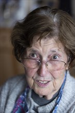 Portrait of a senior citizen with a questioning look, Cologne, North Rhine-Westphalia, Germany,