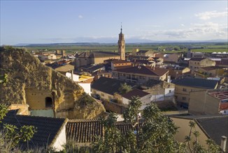 View of a town with striking church tower and surrounding landscape, Valtierra, Navarra Spain