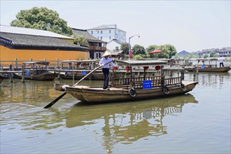 Excursion to Zhujiajiao water village, Shanghai, China, Asia, wooden boat on canal with view of