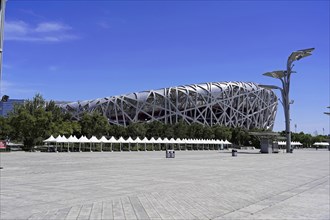Beijing, China, Asia, View of a modern stadium with a complex metal exterior structure, Asia