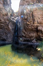 Beautiful waterfall at Charco Azul in El Podemos a Agaete on Gran Canaria, Canary Islands