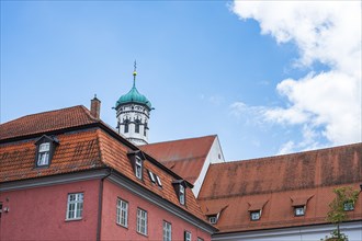 Roof structures and church spire in the old town centre of Memmingen, Swabia, Bavaria, Germany,