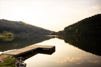Lake at sunset. Beautiful landscape, taken from the shore of a reservoir. Situated in the middle of