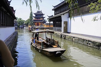 Excursion to Zhujiajiao water village, Shanghai, China, Asia, wooden boat on canal with views of