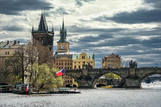 Sightseeing, boat trip, statues, church, flag, Charles Bridge Prague, Prague, Czech Republic,