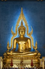 Golden Buddha statue, Bhumispara-mudra, Buddha Gautama at the moment of enlightenment, in the