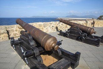 Medieval cannons at fortress wall of Alghero, Sardinia, Italy, Mediterranean, Southern Europe,