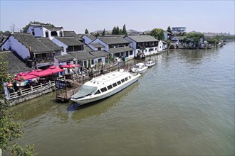 Excursion to Zhujiajiao Water Village, Shanghai, China, Asia, wooden boat on canal with views of