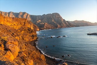 Cliffs and the coast of Agaete at summer sunset in Gran Canaria. Spain