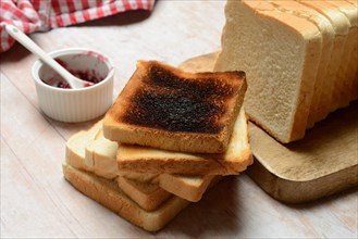 Burnt slice of toast with toast, toast