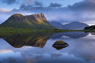 Landscape on the Lofoten Islands. The mountain Offersoykammen and the bay Vagspollen. Mount