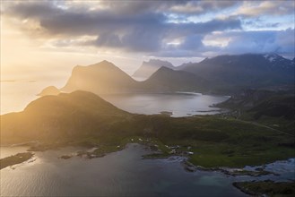 Landscape on the Lofoten Islands. View from the mountain Offersoykammen to the sea, the mountains