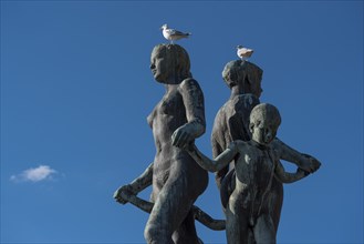 Seagulls on sculptures by Gustav Vigeland, City Hall forecourt, Oslo, Norway, Europe