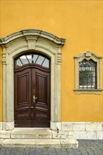 Historic front door in a house of the building complex of Goethe's residence in Weimar, Thuringia,